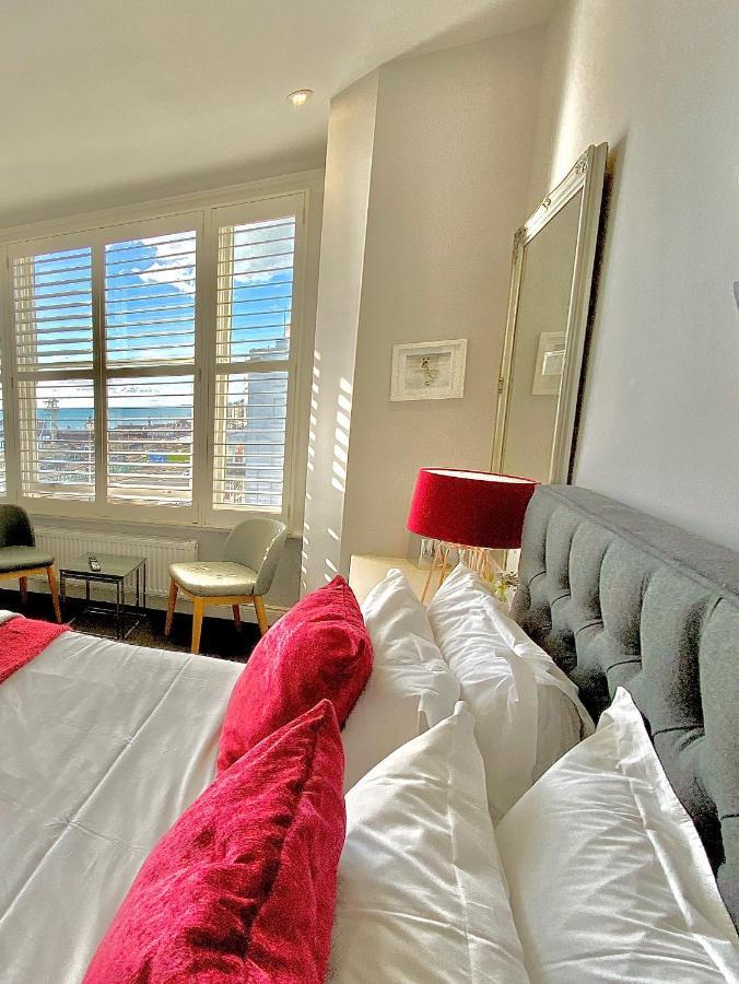 어 룸 위드 어 뷰 호텔 브라이턴 외부 사진 A bedroom at the Cape Heritage